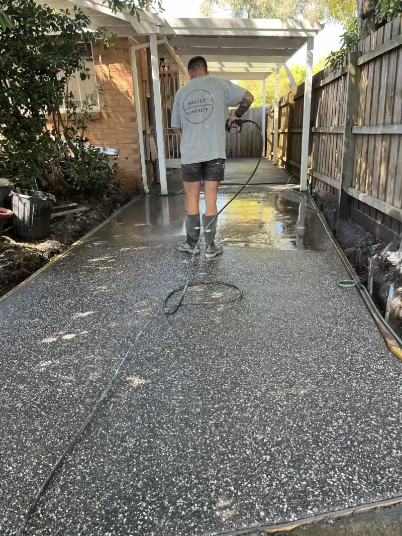 aggregate concrete driveway being completed