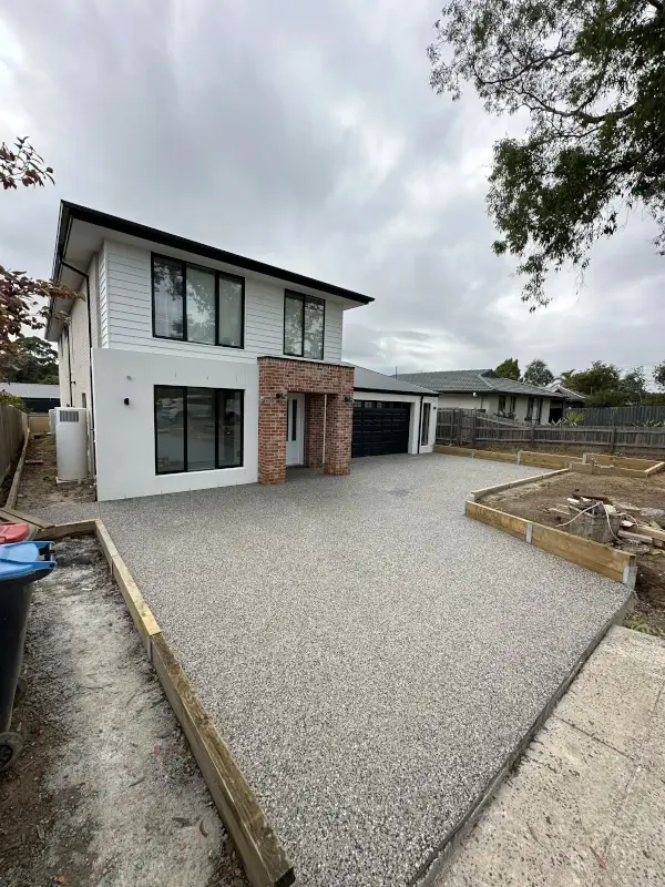 Exposed aggregate concrete driveway